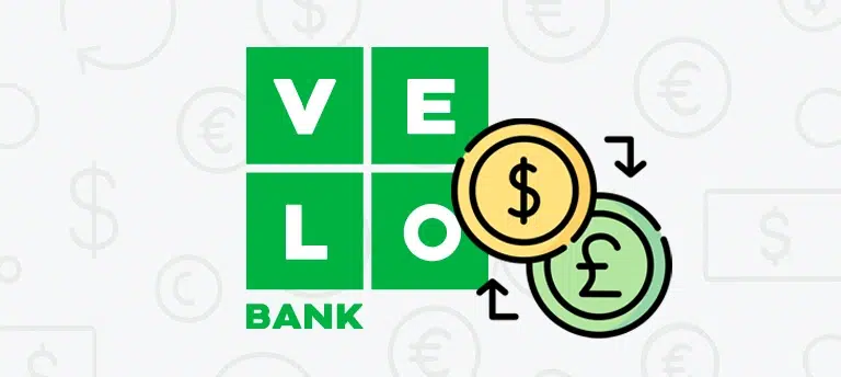 Logo VeloBank z ikoną wymiany walut – symbole dolara i funta z oznaczeniem kursów. Grafika promująca VeloKantor na tle z motywami walutowymi.