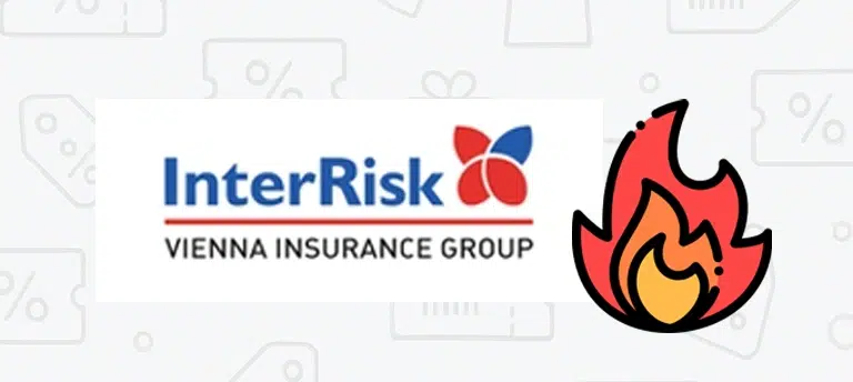 Logo InterRisk Vienna Insurance Group w kolorze niebiesko-czerwonym, z charakterystycznym symbolem w kształcie czterech płatków. Obok znajduje się ikona płomienia, sugerująca promocję lub gorącą ofertę.