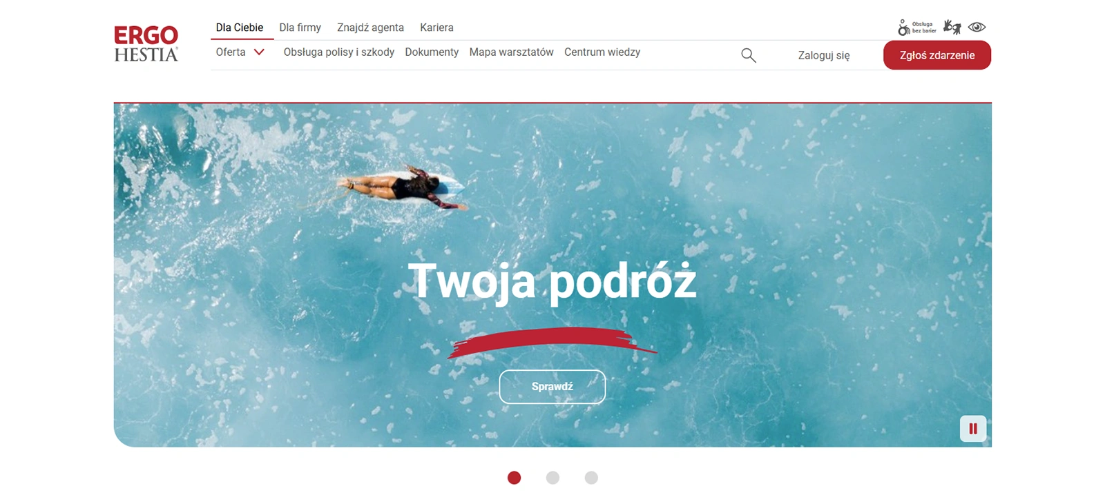Zrzut ekranu strony głównej Ergo Hestia przedstawiający kobietę pływającą na desce surfingowej w turkusowej wodzie. Na środku widnieje napis „Twoja podróż” oraz przycisk „Sprawdź”. U góry widoczne jest logo Ergo Hestia i pasek nawigacyjny.