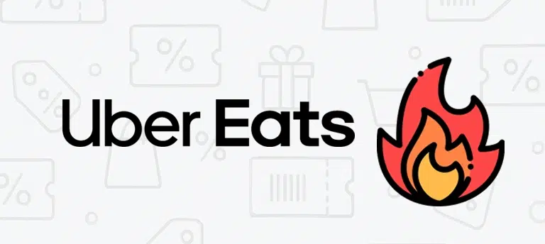 Logo Uber Eats na jasnym tle z ikonami zakupów i rabatów. Obok znajduje się grafika płomienia, sugerująca gorącą promocję lub okazję.