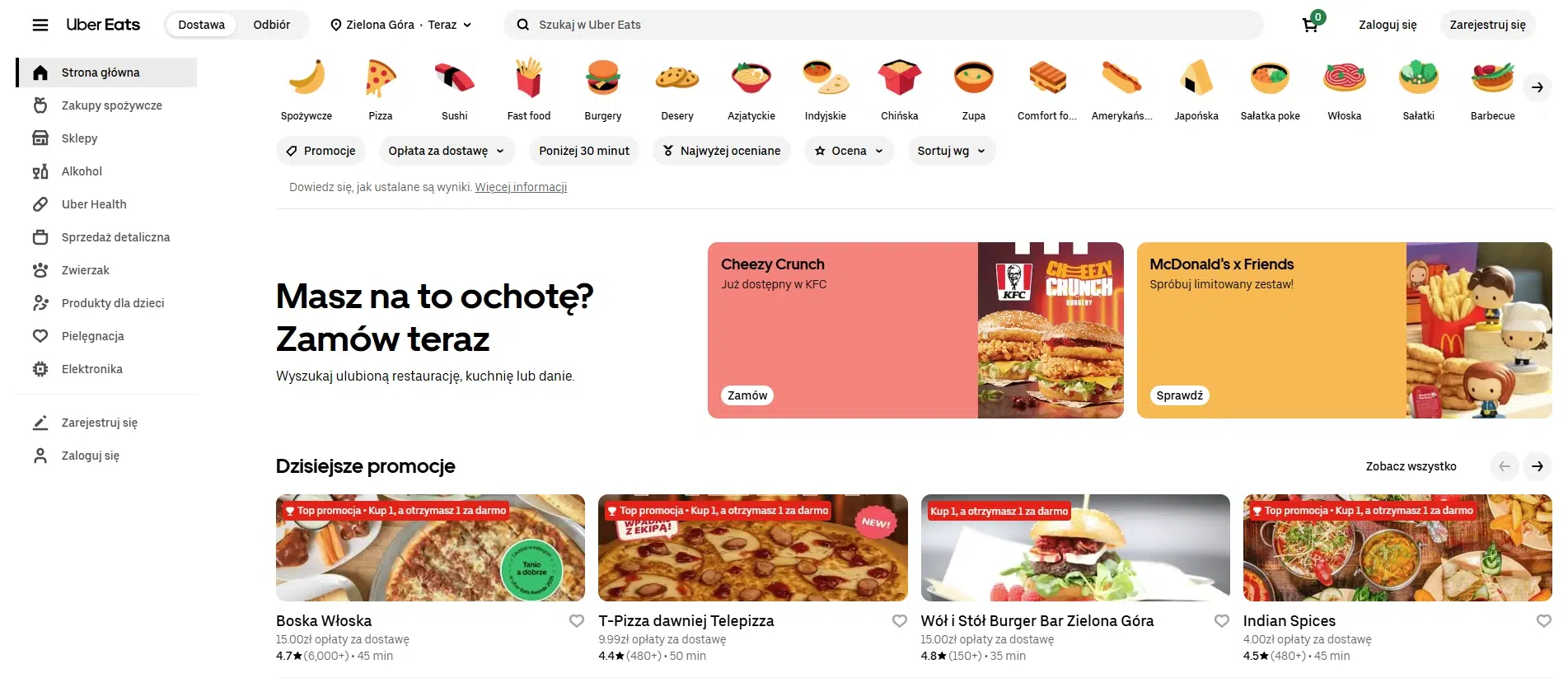 Strona główna Uber Eats w przeglądarce z kategoriami jedzenia u góry, hasłem ‘Masz na to ochotę? Zamów teraz’ oraz kafelkami promocyjnymi restauracji w Zielonej Górze.