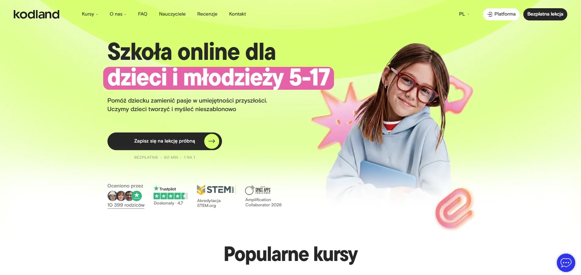 Widok strony głównej Kodland, szkoły online dla dzieci i młodzieży w wieku 5–17 lat, prezentujący kursy rozwijające umiejętności cyfrowe i możliwość zapisania się na bezpłatną lekcję próbną.